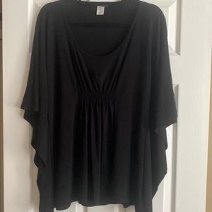 Flattering no wrinkle top.  You can dress this top up or down.